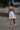 Tea Princess Amara Dress – ivory linen-blend open-back mini with adjustable ties and bows to tie up the back