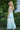 Tween girl wearing Meadow pastel teal lace two-piece set by Tea Princess – halter top and flowy skirt